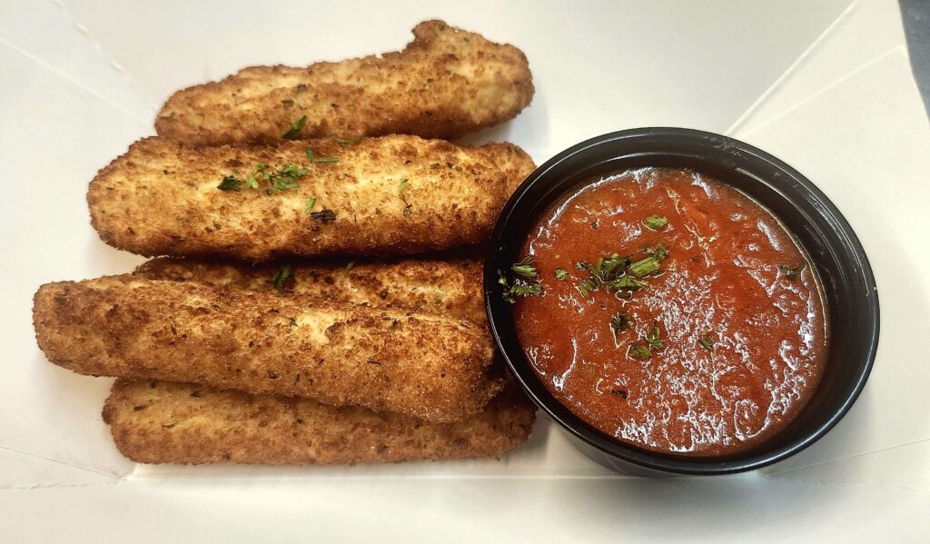Fried clam strips with cocktail sauce