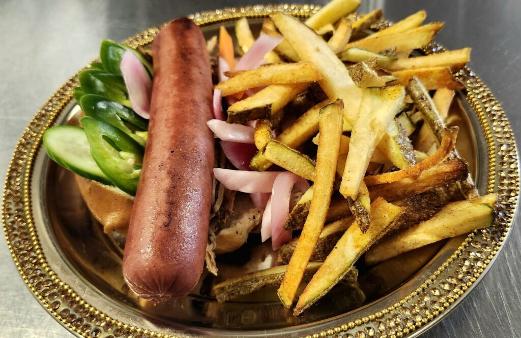 Grilled hot dog with fries